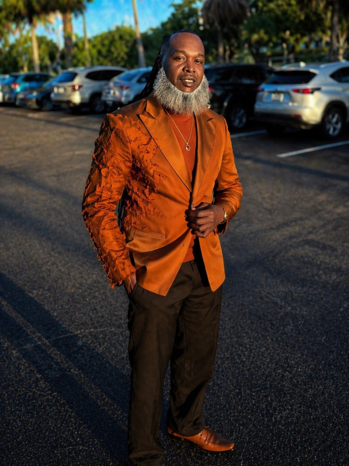 Coach Noble Grayson in a copper blazer